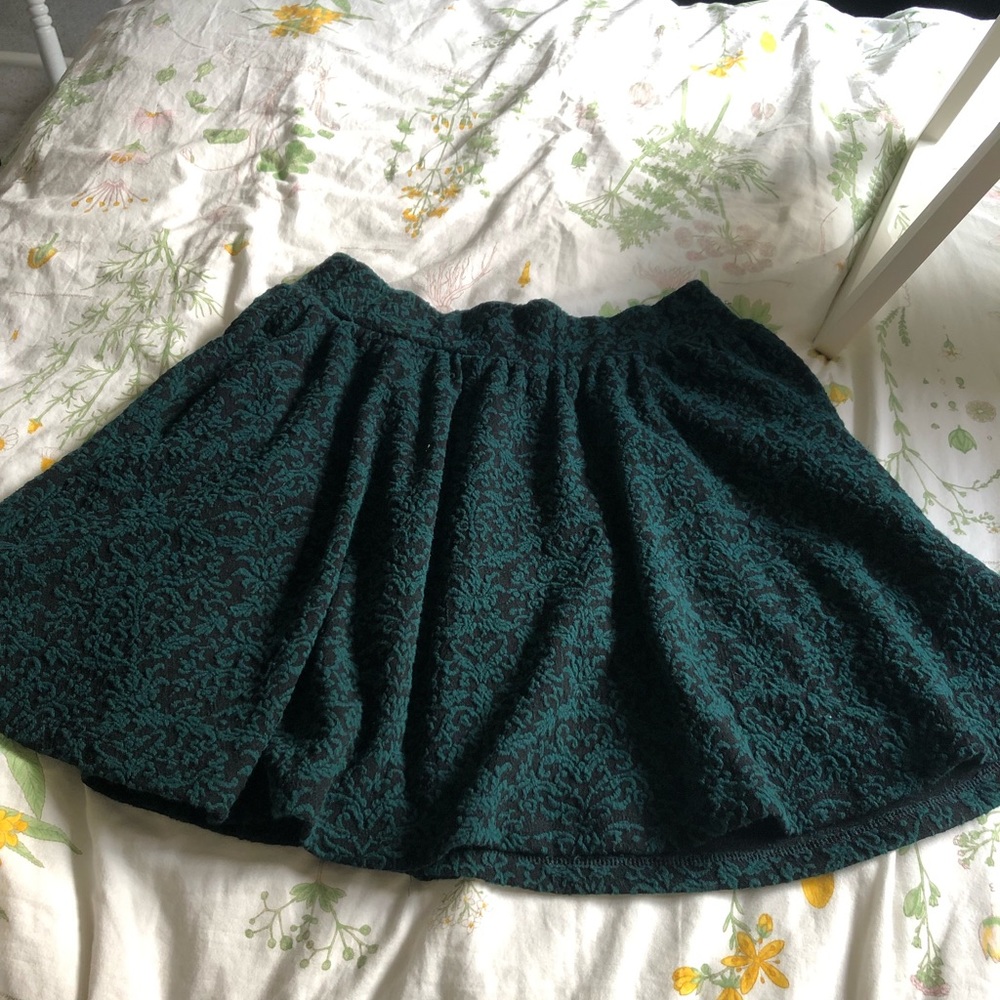 Green and black skater skirt